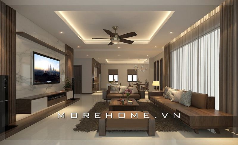 Thiết kế sofa hiện đại dáng văng tiện lợi, thoáng đãng nhưng đẳng cấp sang trọng với chất liệu gỗ óc nâu trầm cùng vỏ bọc da tinh tế nổi bật trong không gian phòng khách căn hộ chung cư.